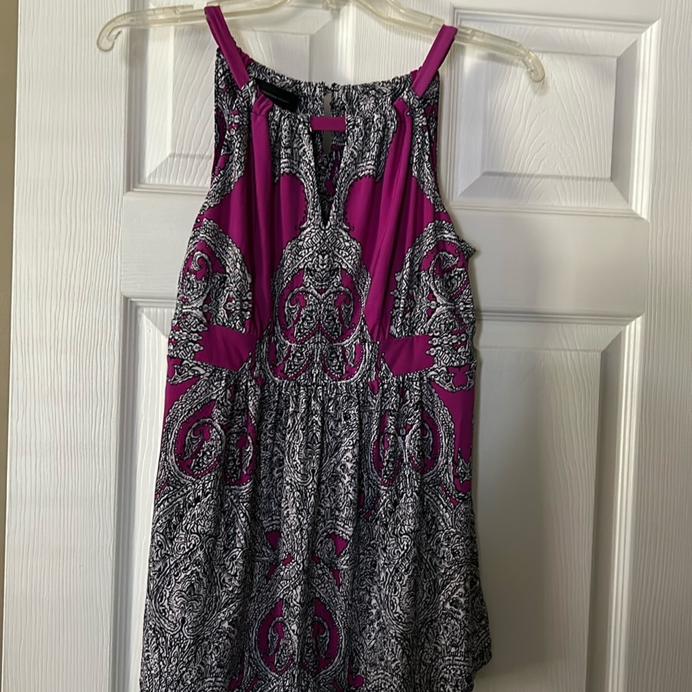 Beautiful sleeveless open neck top